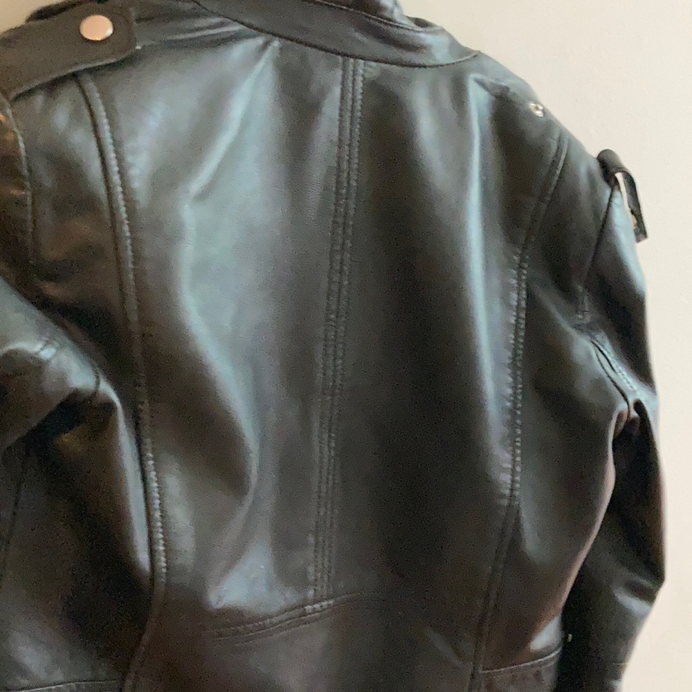 Bundle of jacket and shirts
